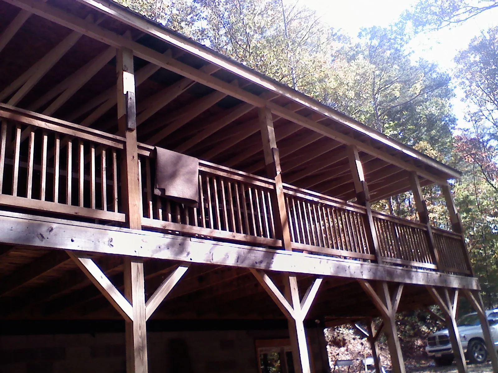 Timber framing under a new elevated porch and deck — Roof Leak Repair in Pewaukee by Roofing Brothers